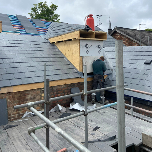 Hartington Road Liverpool slate roofing work with tradesman installing dormer