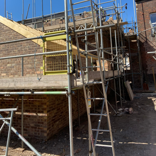 Hartington Road Liverpool upper floor construction showing timber frame and scaffolding