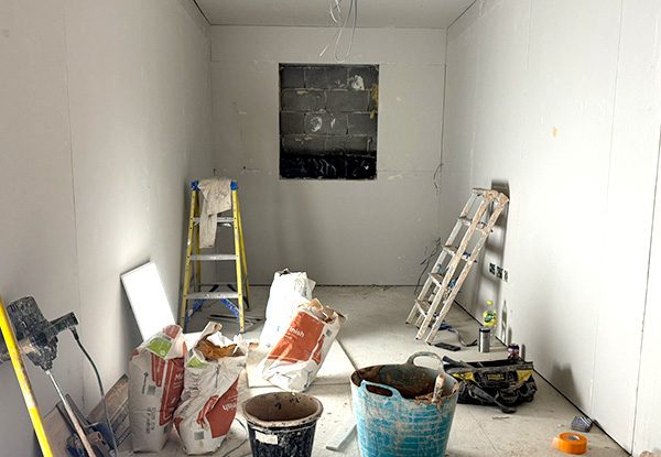 New Start Homes Liverpool office construction showing interior room fitting out with plasterboard walls