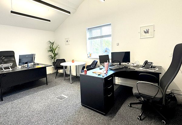 New Start Homes Liverpool office completed mezzanine workspace showing modern office furniture and lighting