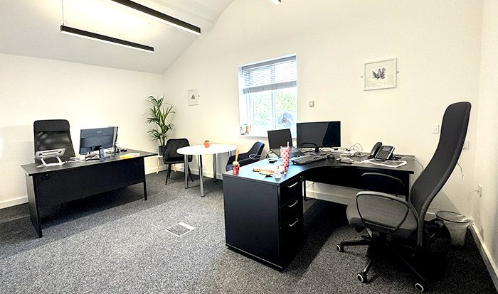New Start Homes Liverpool office completed mezzanine workspace showing modern office furniture and lighting